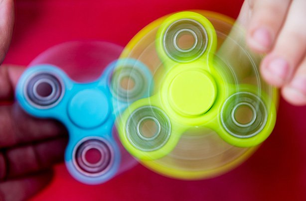 Mandatory Credit: Photo by Aled Llywelyn/Athena Picture/REX/Shutterstock (8790426r) A young boy uses a fidget spinner Fidget spinners, UK - May 2017 Inventor Catherine Hettinger, creator of the fidget spinner has revealed she hasnt made a single penny off the global craze, because she couldnt afford the £310 fee to renew the patent.