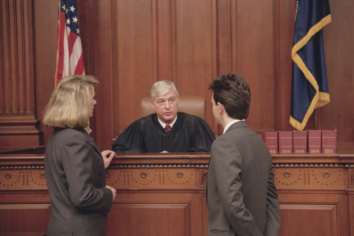 Judge and lawyers in courtroom