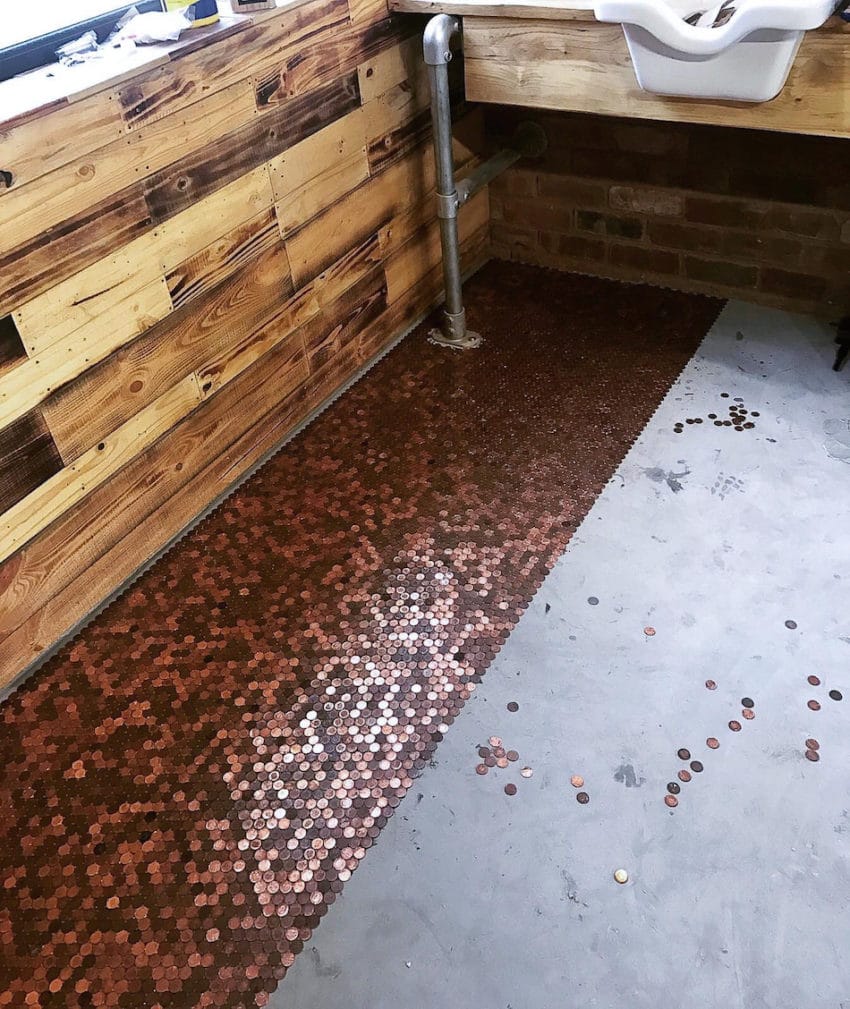 COLLECT - The progress of the laying of the penny floor, at the barber shop BS4,  Lower Gornal, Dudley, West Midlands.  See NTI story NTIPENNIES.  A new barber shop has a very unique feature - a floor made out of 70,000 pennies.  The eye-catching floor at BS4 in Dudley, West Midlands, took three-and-a-half months to make.  Brett Davies, who has been in the business for 26 years, also has shops in Wordsley, Wombourne and Wall Heath but he said this was the "most extravagant" of the four.