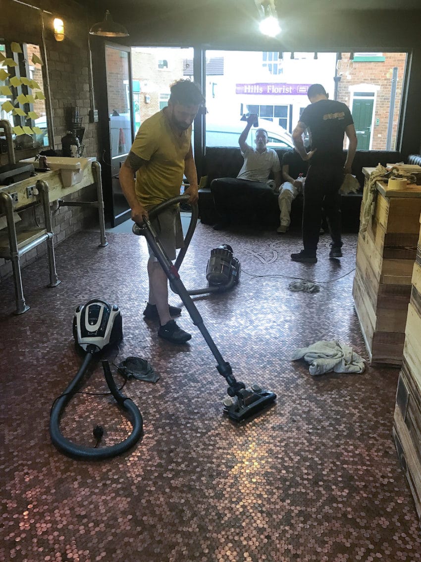 COLLECT - Completion of the penny floor, 3rd July 2017, at the barber shop BS4,  Lower Gornal, Dudley, West Midlands.  See NTI story NTIPENNIES.  A new barber shop has a very unique feature - a floor made out of 70,000 pennies.  The eye-catching floor at BS4 in Dudley, West Midlands, took three-and-a-half months to make.  Brett Davies, who has been in the business for 26 years, also has shops in Wordsley, Wombourne and Wall Heath but he said this was the "most extravagant" of the four.