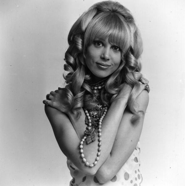 26th June 1967: Fashion model Patti Boyd, wife of Beatle George Harrison, modelling a wig. (Photo by M. McKeown/Express/Getty Images)