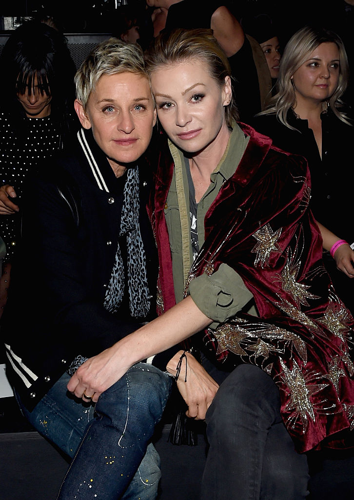 LOS ANGELES, CA - FEBRUARY 10: TV personality (L) Ellen DeGeneres, in Saint Laurent by Hedi Slimane, and actress Portia de Rossi, in Saint Laurent by Hedi Slimane, attend Saint Laurent at the Palladium on February 10, 2016 in Los Angeles, California for the Saint Laurent Los Angeles show. (Photo by Larry Busacca/Getty Images for SAINT LAURENT)